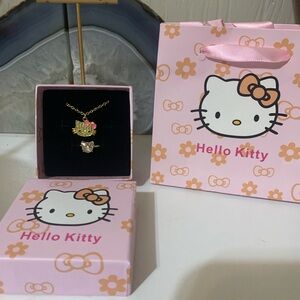 Hello Kitty Gold Tone Necklace with Pink Bow Accent